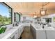 Spacious kitchen with white cabinets, quartz countertops, a center island, and stainless steel appliances at 347 S White Tail Dr, Franktown, CO 80116