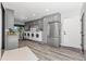 Spacious laundry room with modern appliances, ample counter space, and convenient storage solutions at 347 S White Tail Dr, Franktown, CO 80116