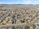 Great aerial of neighborhood and a lake with mountain backdrop at 13535 W 62Nd Ln, Arvada, CO 80004