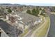 Aerial view of the community featuring garages and rooftops at 13535 W 62Nd Ln, Arvada, CO 80004