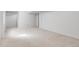 Spacious basement with neutral carpet, ready for customization at 13535 W 62Nd Ln, Arvada, CO 80004