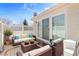 Cozy patio with comfortable seating, perfect for outdoor relaxation at 13535 W 62Nd Ln, Arvada, CO 80004