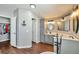 Spacious bathroom with double sinks and walk-in closet at 11100 Haskell Creek Rd, Larkspur, CO 80118