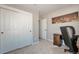 Bright bedroom with double door closet and office space at 11100 Haskell Creek Rd, Larkspur, CO 80118