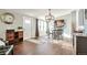 Dining room with wood floors, chandelier, and furniture at 11100 Haskell Creek Rd, Larkspur, CO 80118