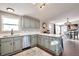 Modern kitchen with stainless steel appliances and ample counter space at 11100 Haskell Creek Rd, Larkspur, CO 80118