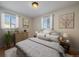 Bright bedroom with hardwood floors and neutral decor at 4157 Perry St, Denver, CO 80212