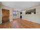 Dining area with hardwood floors and view of the front entry at 4157 Perry St, Denver, CO 80212