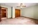 Bedroom with neutral walls, carpet, ceiling fan, and a closet, providing a calm and inviting space at 12842 Bellaire St, Thornton, CO 80241