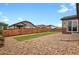Backyard with a privacy fence and a grass area at 30 S Ider Way, Aurora, CO 80018