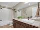Bathroom featuring granite counters and a shower/bath tub combo at 30 S Ider Way, Aurora, CO 80018