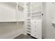Walk-in closet with custom shelving and drawers at 5836 S Vivian Way, Littleton, CO 80127