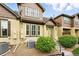 Townhouse exterior with well-kept landscaping and a welcoming front entrance at 5836 S Vivian Way, Littleton, CO 80127