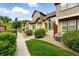 Inviting townhouse exteriors with lush greenery and well-maintained landscaping at 5836 S Vivian Way, Littleton, CO 80127