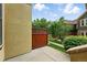 Exterior patio with views of the neighborhood and wooden privacy fence at 5836 S Vivian Way, Littleton, CO 80127
