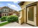 Close up of a patio with neutral accents and well kept landscaping at 5836 S Vivian Way, Littleton, CO 80127