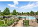Community pool and lounge area with manicured landscaping at 5836 S Vivian Way, Littleton, CO 80127