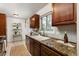 Charming kitchen with granite counters, lots of light and updated appliances at 3379 W Wagon Trail Dr, Englewood, CO 80110