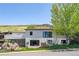 Modern home with mountain views, large windows, and a beautifully landscaped yard at 330 Ptarmigan St, Golden, CO 80403