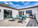 Spacious outdoor patio with grill, comfortable seating, and stylish design for relaxation and entertaining at 330 Ptarmigan St, Golden, CO 80403
