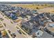 Aerial view of a house in a residential neighborhood with a backyard and surrounding homes at 9091 E 59Th North Pl, Denver, CO 80238