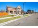 House exterior, street view, with a well-maintained lawn at 9091 E 59Th North Pl, Denver, CO 80238