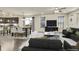 Open concept kitchen and dining area with modern cabinetry and stainless steel appliances at 9091 E 59Th North Pl, Denver, CO 80238