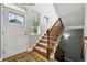 Bright foyer features a staircase and entry to the home at 3240 Spruce St, Denver, CO 80238