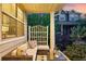 Inviting front porch with comfortable seating area to enjoy neighborhood views at 3240 Spruce St, Denver, CO 80238