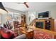 Inviting living room with fireplace, hardwood floors, and cozy furniture at 3240 Spruce St, Denver, CO 80238