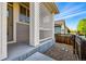 Side porch with lattice trim and view of neighborhood at 3240 Spruce St, Denver, CO 80238