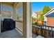 Charming porch featuring a grill and decorative lattice privacy screen at 3240 Spruce St, Denver, CO 80238