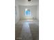 Bright bedroom featuring carpet, natural light from a window, and neutral wall colors at 15600 E 33Rd Pl, Aurora, CO 80011