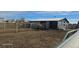 Fenced-in horse pen with a horse inside near a structure, providing a secure and functional space at 15600 E 33Rd Pl, Aurora, CO 80011