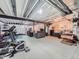 Spacious unfinished basement featuring exposed ceiling, concrete floor, and ample room for customization at 22466 E Layton Cir, Aurora, CO 80015