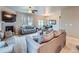 Spacious living room with a cozy fireplace and comfortable seating at 22466 E Layton Cir, Aurora, CO 80015