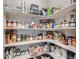 Well-organized pantry with ample shelving for food and household storage at 22466 E Layton Cir, Aurora, CO 80015