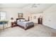 Large main bedroom boasts great lighting, a ceiling fan and ample closet space at 11274 W 54Th Ln, Arvada, CO 80002