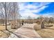 Skyline Park entrance with brick walkway and play area in the distance at 11274 W 54Th Ln, Arvada, CO 80002