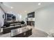 Basement with kitchenette, leather couch and trunk coffee table at 1599 S Telluride St, Aurora, CO 80017