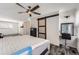 Bedroom featuring an extra large ceiling fan and a frosted sliding door at 1599 S Telluride St, Aurora, CO 80017