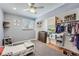 bedroom with closet featuring open shelves and dresser near window at 1599 S Telluride St, Aurora, CO 80017