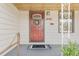 Inviting front door with wreath and visible house number '3198' at 3198 W Amherst Ave, Denver, CO 80236