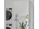 New laundry machines, storage, and plant accents at 3198 W Amherst Ave, Denver, CO 80236