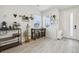 Dining area with bar table and well-placed décor near the entrance at 5388 Routt St # B, Arvada, CO 80002