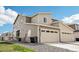 Two-story home with a two car garage, neutral siding and well maintained landscaping at 5388 Routt St # B, Arvada, CO 80002