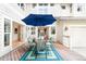 Charming outdoor deck with a dining set, seamlessly connecting indoor spaces for relaxed gatherings and enjoyment at 6032 Umber St, Arvada, CO 80403