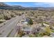 Panoramic aerial view of a quaint neighborhood with stunning mountain views and lush greenery at 3200 Eastman Ave, Boulder, CO 80305