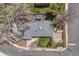Aerial view of home featuring fenced yard, covered patio and outdoor living space at 3200 Eastman Ave, Boulder, CO 80305