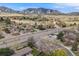 Expansive aerial shot showcasing a charming neighborhood with mountain views in the background at 3200 Eastman Ave, Boulder, CO 80305